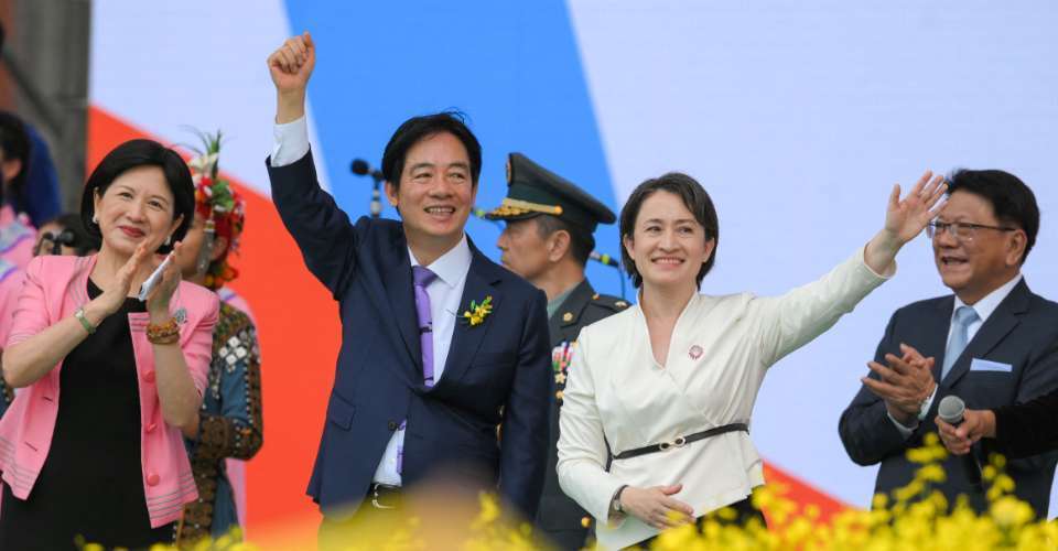 Taiwan's President Lai Ching-te (center), incoming First Lady Wu Mei-ju (left), and Vice President Hsiao Bi-khim (right) react after his inaugural speech after being sworn into office during the inauguration ceremony at the Presidential Office Building in Taipei on May 20. 